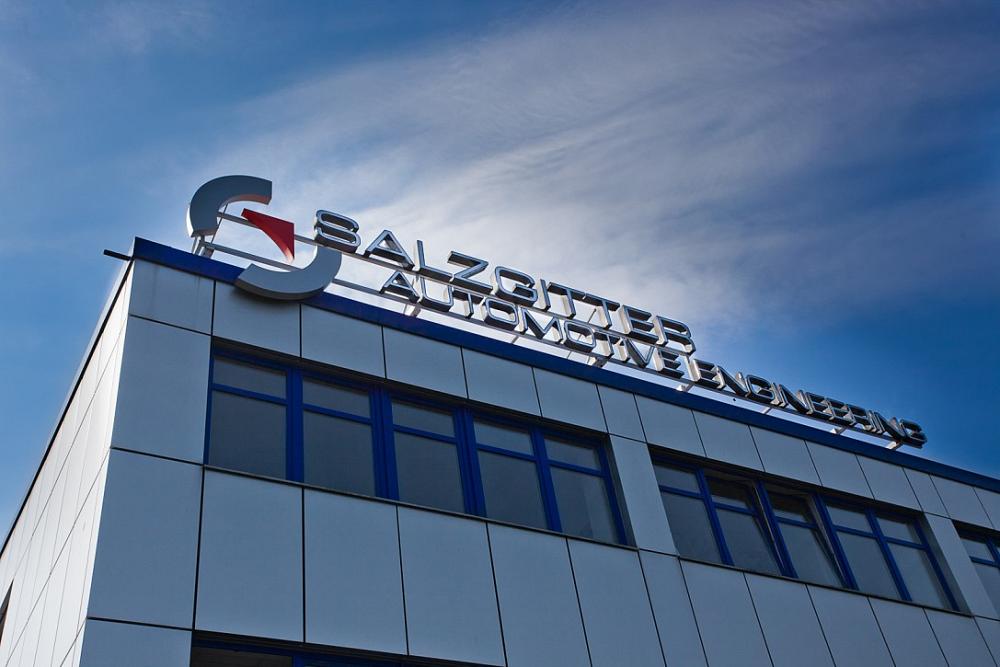 Headquarters of Salzgitter Automotive Engineering GmbH & Co. KG – About Us Modern company building of Salzgitter Automotive Engineering GmbH & Co. KG with logo – About Us